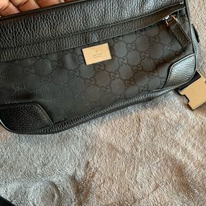 Gucci monogram belt bag with leather trim